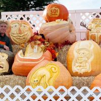 Farmer Mike with 50th anniversary tribute pumpkins
