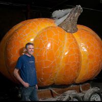 Peter Hazel with his mosaic pumpkin sculpture